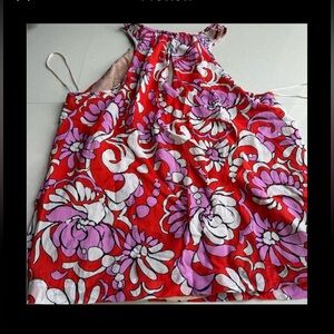 Beautiful design in the front. Fits very comfortably. 92% silk